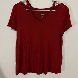Off the shoulder, maroon top.